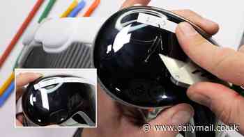 Apple Vision Pro fails the scratch test! Watch the excruciating moment a YouTuber uses a scalpel to scrape across the screen of the $3,500 headset