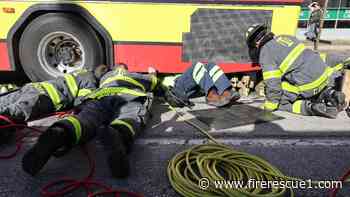 Photo of the Week: Worker pinned underneath Indianapolis bus