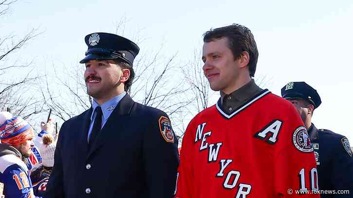 Rangers honor FDNY, NYPD with jerseys while arriving in firetrucks, police cars before Stadium Series game