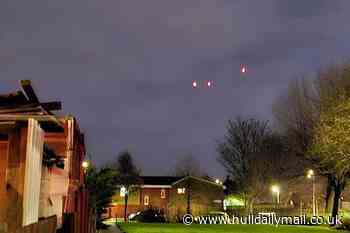 Mystery as three orange lights 'fly in formation' above Bransholme