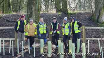 Accrington training group and environment charity team up