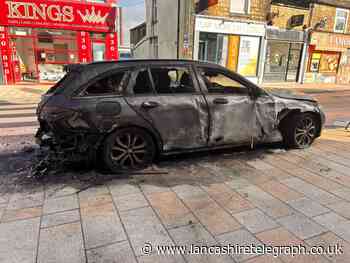 Firefighters tackle car fire in Burnley town centre