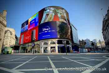 What is Piccadilly Circus famous for and how it got its name