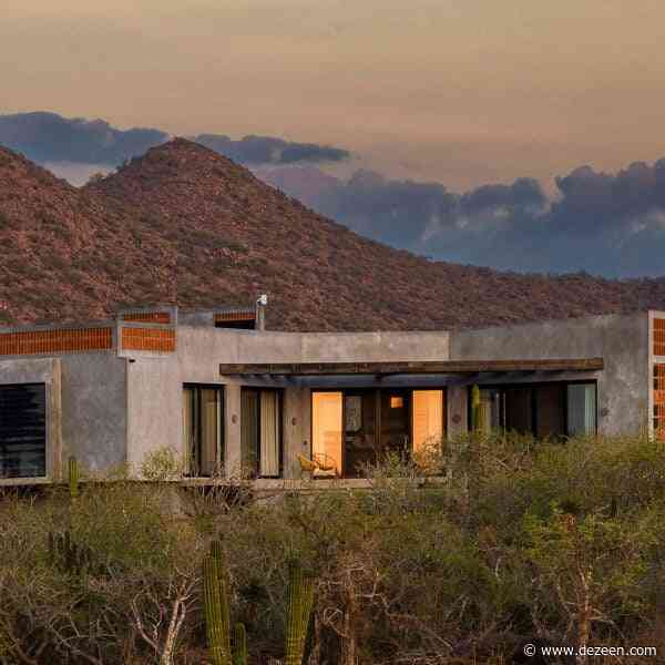 RED Arquitectos integrates corn millstone into facade of Mexican house