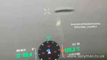 EXCLUSIVE: Disc-shaped UFO is filmed by Ukrainian military in warzone: 'What the f*** is this... maybe ram it?'