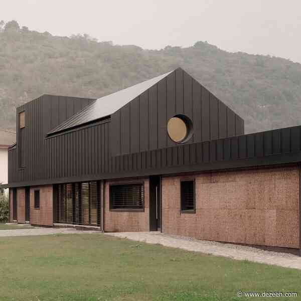 LCA Architetti nestles angular cork-clad home into Italian valley