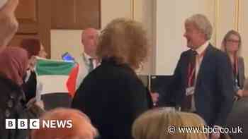 Councillor allegedly pushes protester in meeting