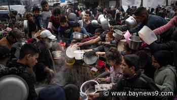 Strike on Palestinians waiting for aid kills more than 100, Gaza officials say, taking war's toll past 30,000