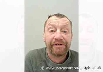 Racist thug sparked panic at Blackburn Town Hall