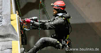 Nachtschicht: Fassadendämmung von Fassadenkletterern montiert
