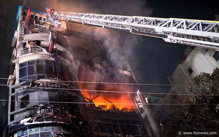 Shopping mall that caught fire, killing 46 people had no emergency exits, Bangladeshi leader says
