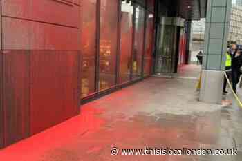 Aldgate office buildings painted with red graffiti