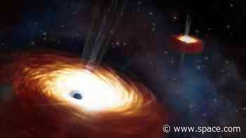 Heaviest pair of black holes ever seen weighs 28 billion times more than the sun