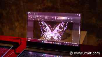 Lenovo's See-Through Laptop Blends Real and Virtual Worlds     - CNET