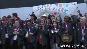 Athletes receive special welcome upon return from Special Olympics