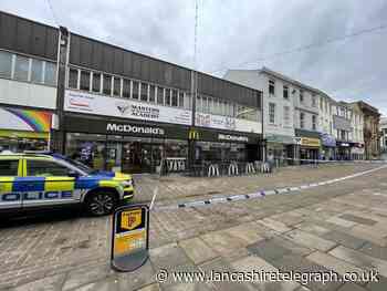 A man has died after being found unresponsive at Blackburn McDonald's