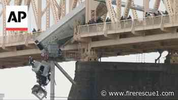 Video, photos: Dramatic rescue saves trucker hanging off Ky. bridge