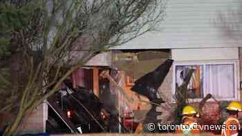 Vehicle smashes into home after driver flees scene of suspected bank robbery in Ajax: Police