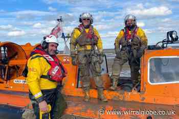RNLI volunteers rescue person stuck in mud during 200th celebrations