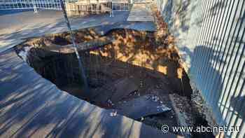 Sinkhole above M6 in Sydney's south under investigation, but what exactly causes them?