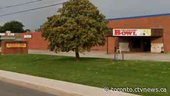 Three transport trucks found engulfed in flames behind Burlington, Ont. bowling alley: police