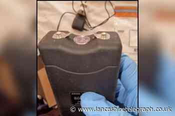 Taser and quantity of drugs seized from address in St Annes