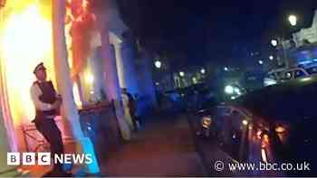 'Get out!' - Footage shows police rescuing residents from fire