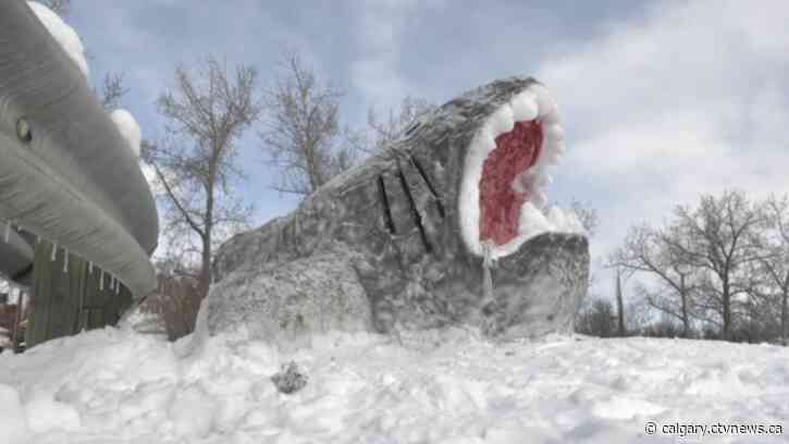 Shark-infested snow? Calgary man makes eye-catching winter sculptures