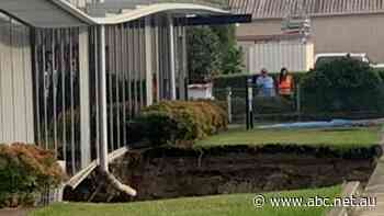 Concrete trucks spent days filling a void under a Sydney office block. How concerning are sinkholes?