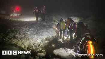 Three people rescued after getting stuck on walk