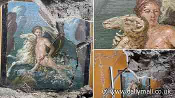 Pompeii's hidden treasure is revealed after 2,000 years: Archaeologists discover a lavish painting of a mythological scene while excavating the ancient Roman city