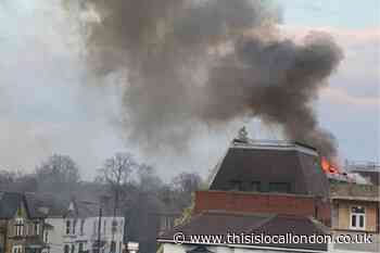 Romford Road Forest Gate police station roof alight