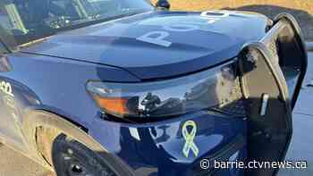 Allegedly impaired driver crashes head-on into marked police vehicle