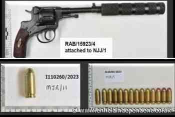 Two men jailed after loaded gun found at Enfield home