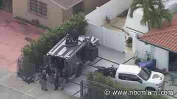Video shows Hialeah home surrounded by SWAT personnel after man barricades himself inside