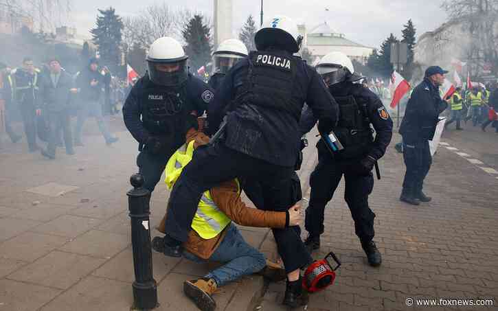 Polish government blames 'hooligans' for violent clashes as farmers protest Ukraine imports