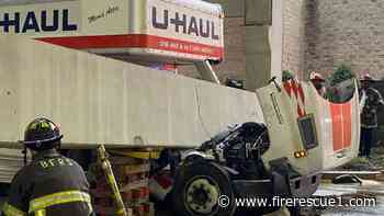 Ala. firefighters save U-haul driver pinned by concrete beam