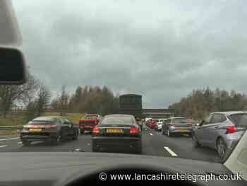 Traffic held between Blackburn and Accrington on M65 due to crash