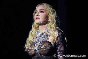 Madonna calls out fan for sitting during concert before realizing they were in wheelchair