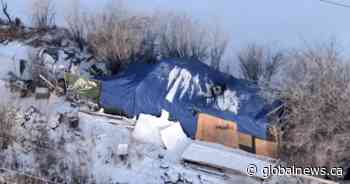 Calgary police remove homeless encampment after complaints of violence