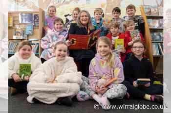 Bellway Homes donates cash for Wirral schools' new books