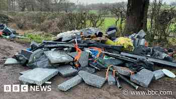 Two men charged in fly-tipping probe