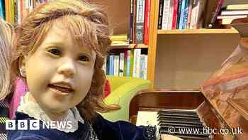 Celebrity psychic buys 'creepy' charity shop doll