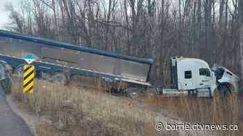 Motorist charged after cutting off transport truck on Hwy 400, causing 3-vehicle crash