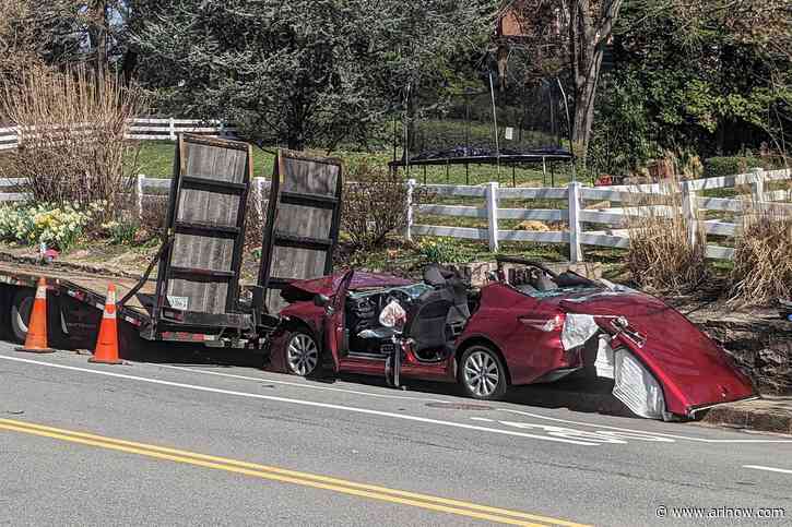 NEW: Two hospitalized after car crashes into parked trailer