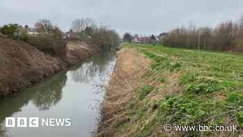 Police investigation after body found near school