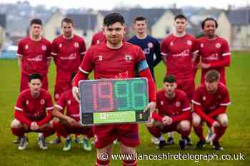 Longridge Town get new substitutes board after kind donation