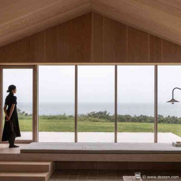 Norm Architects creates cedar-clad summerhouse that nods to traditional barns
