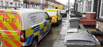 White tent erected outside house on Wirral street