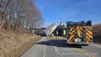 Video: N.Y. firefighters respond to truck left dangling from bridge